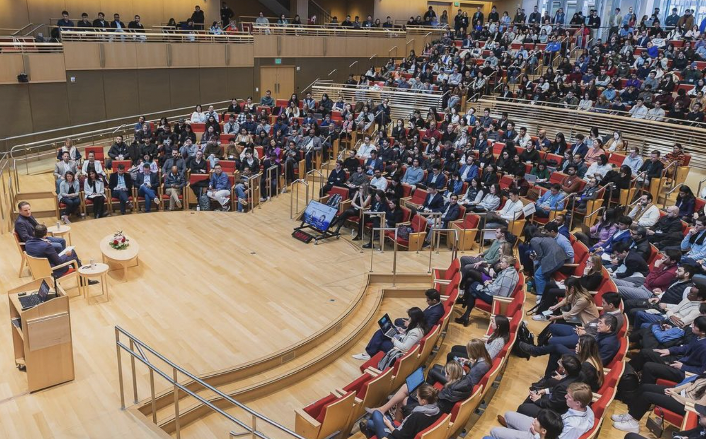 Conference audience watching a speaker
